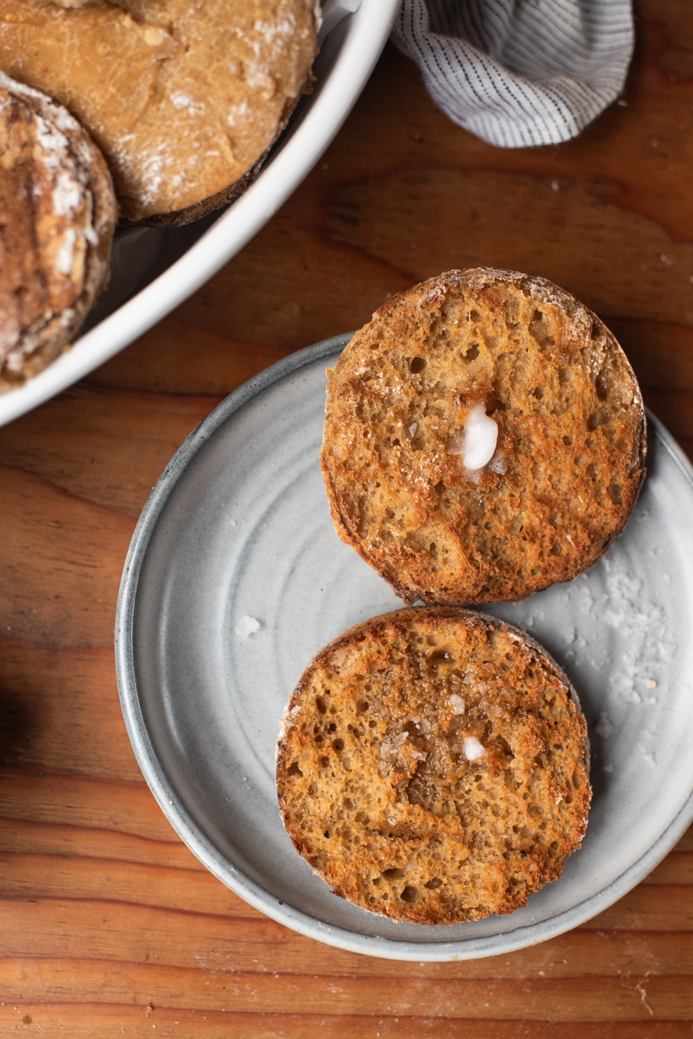 Toasted whole English muffin on a plate