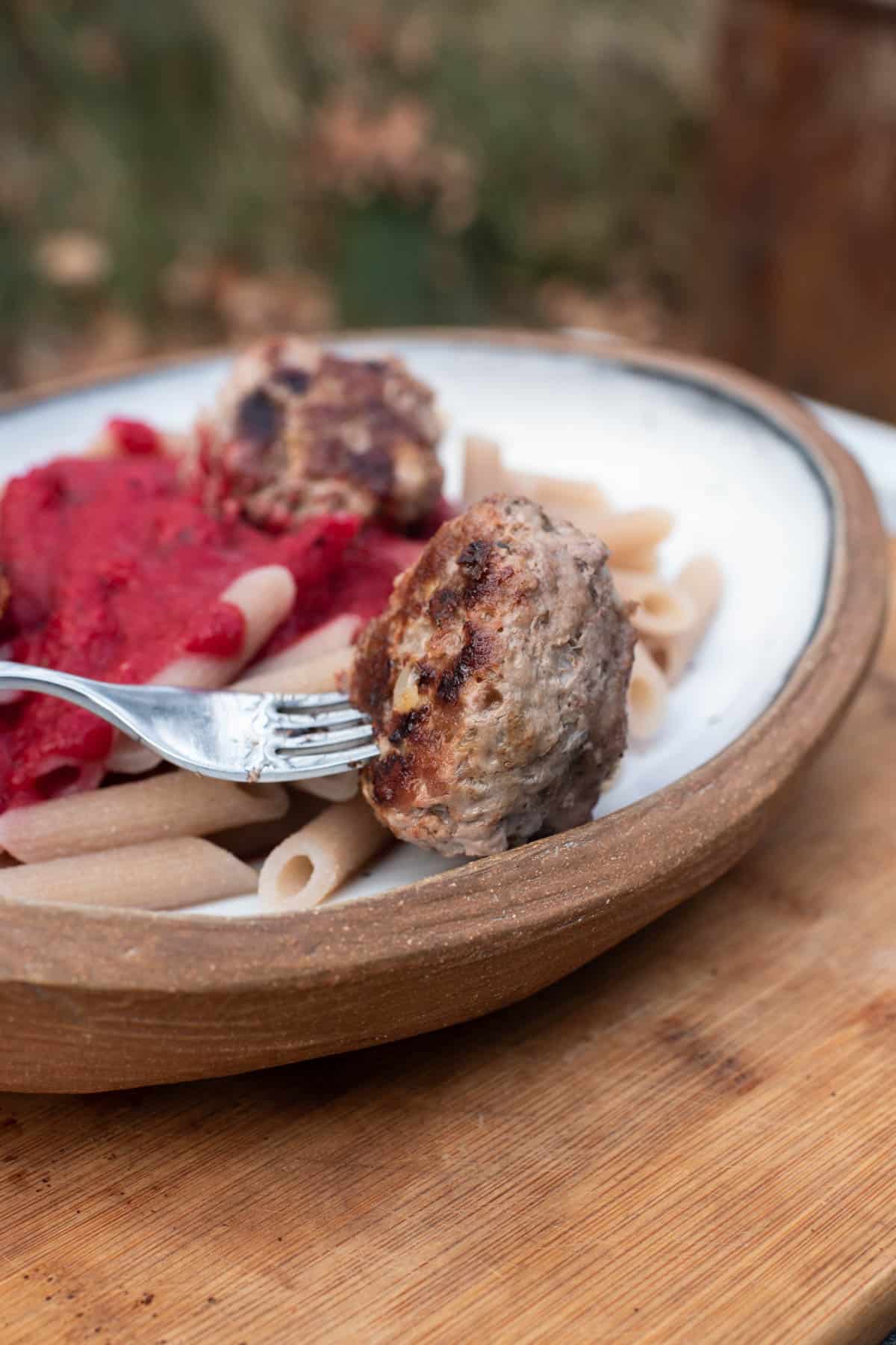 aip pork and beef meatball served with pasta