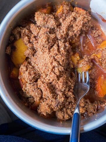 aip baked peach crisp served warm