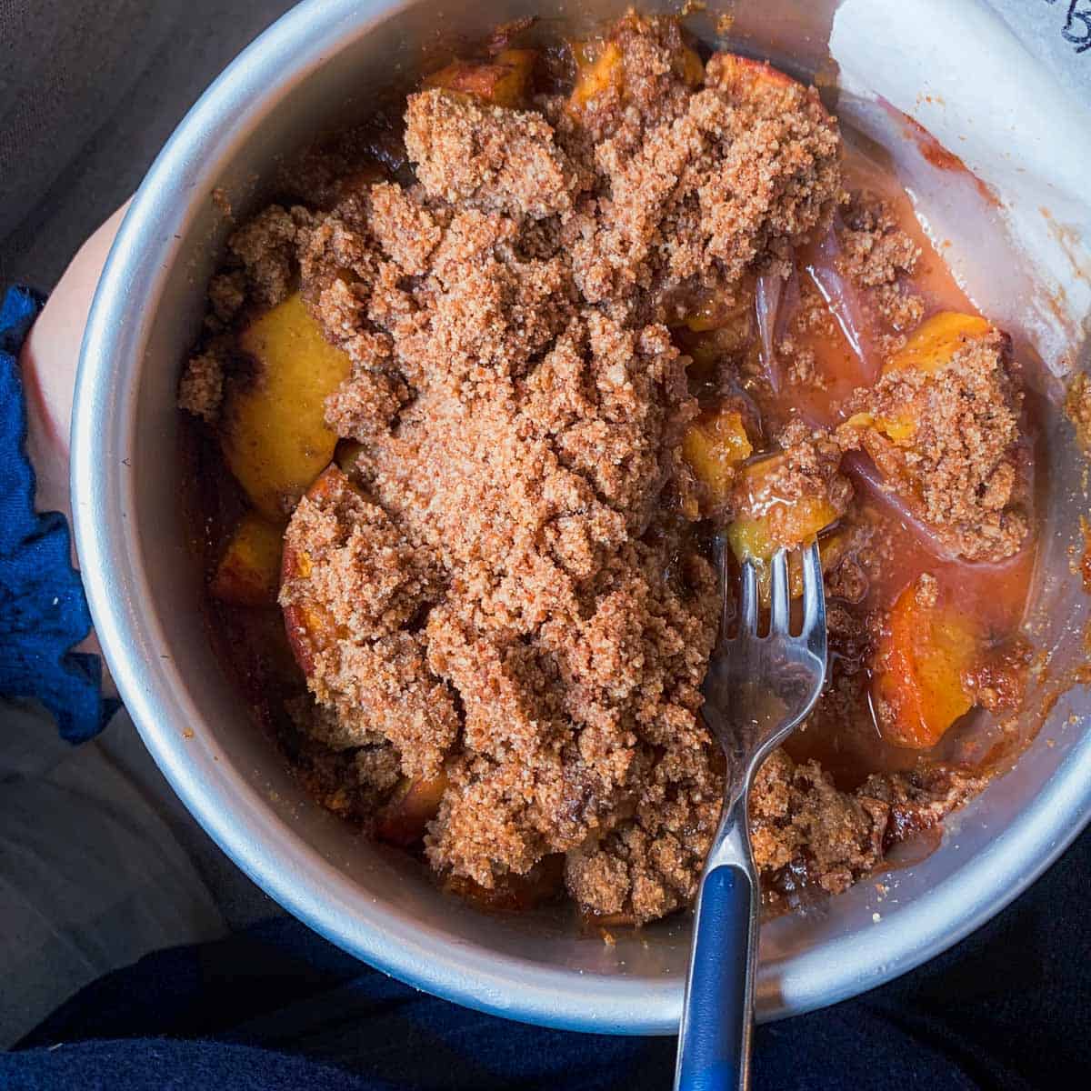 aip baked peach crisp served warm