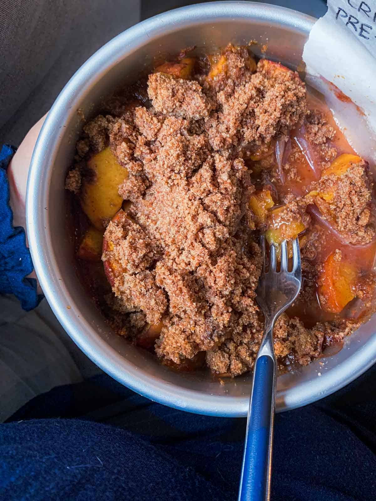 peach crisp served in baking dish