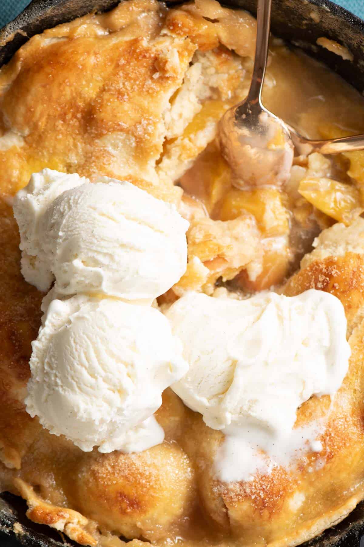 vanilla ice cream served over peach pie