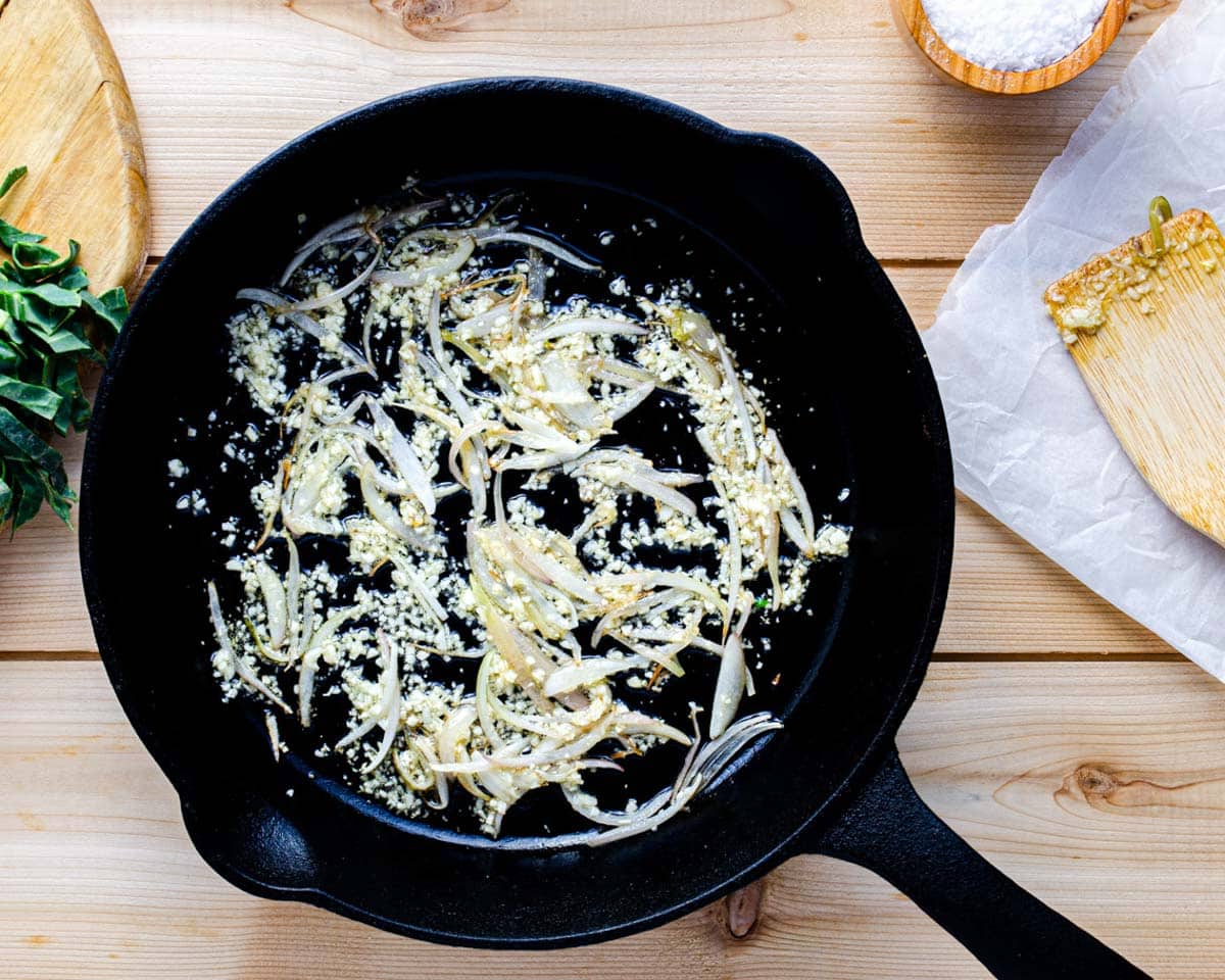 sautéed onions and garlic in cast iron skillet