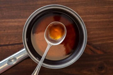 melted coconut oil and maple syrup in pot
