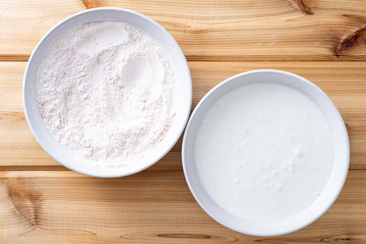cassava flour in bowl and coconut milk in bowl