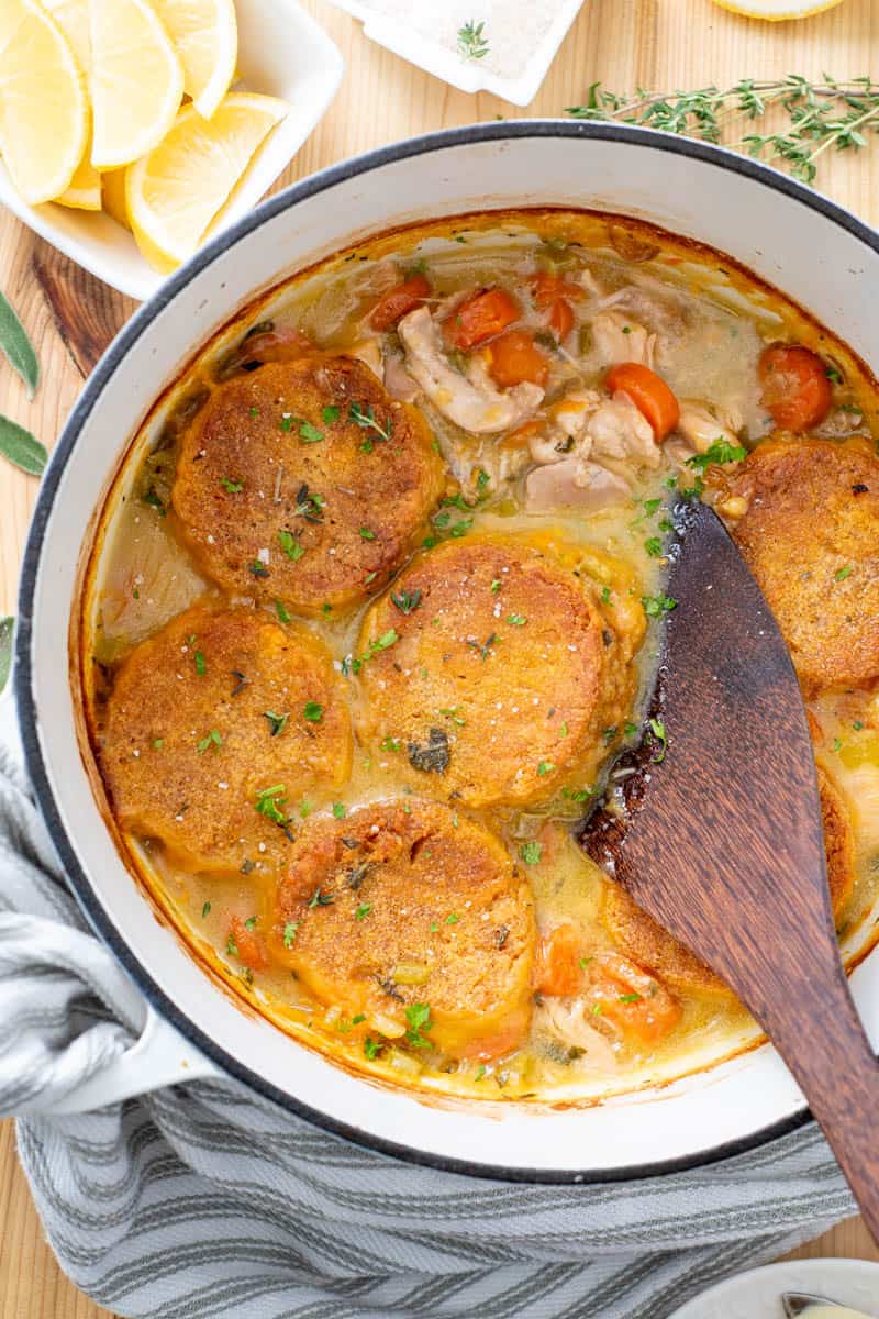chicken pot pie in Dutch oven with AIP sweet potato biscuits on top
