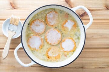 biscuit dough over chicken vegetable gravy filling