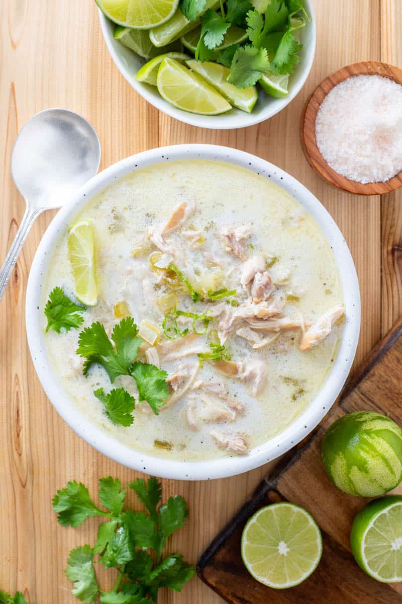 AIP chicken soup in bowl with cilantro and lime