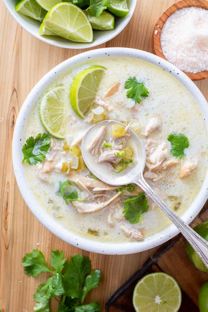 healing chicken soup in a bowl with spoon