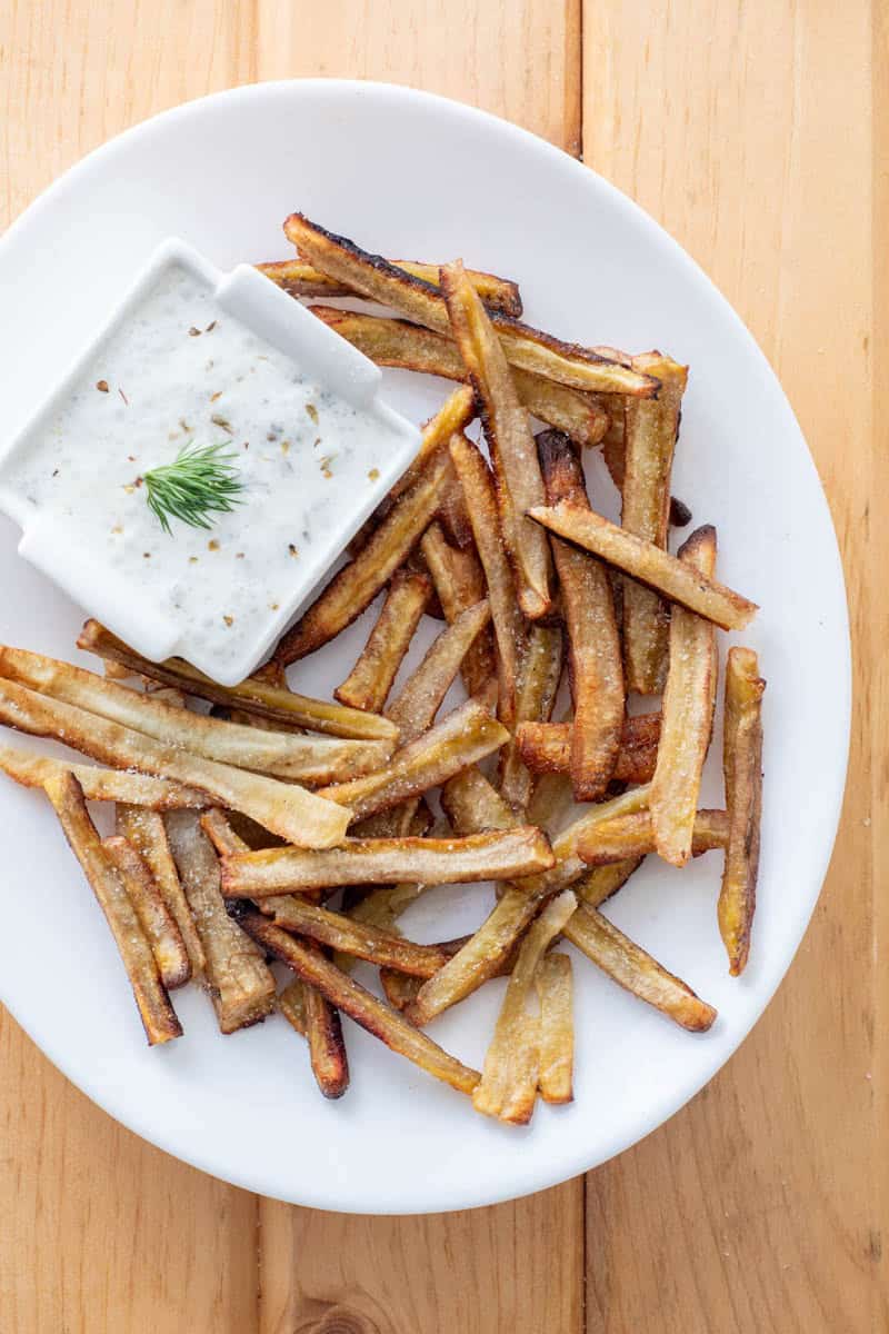 Green banana fries on plate with dairy-free ranch dip