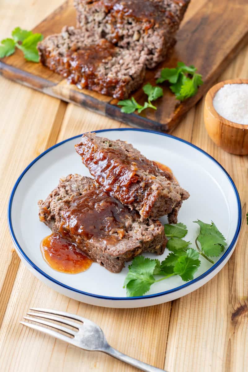 Asian meatloaf with sweet and sour sauce on plate