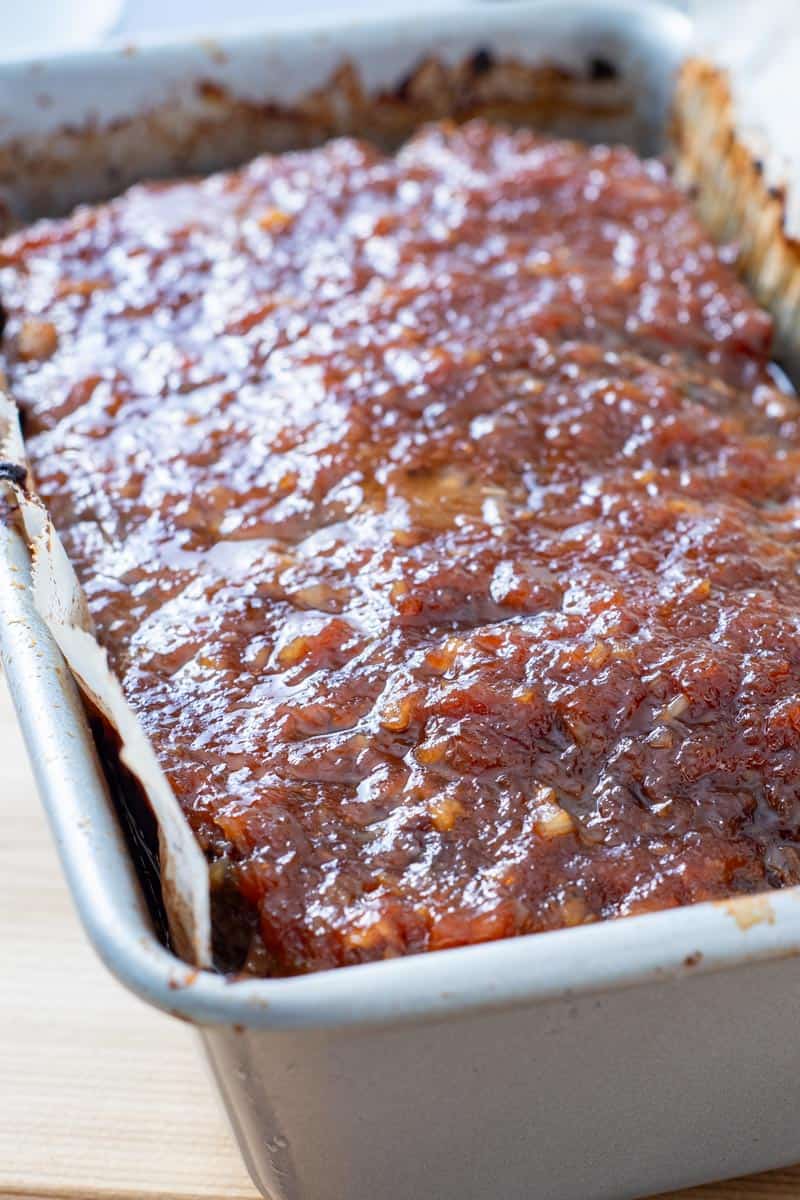 sweet and sour glazed meatloaf in baking pan