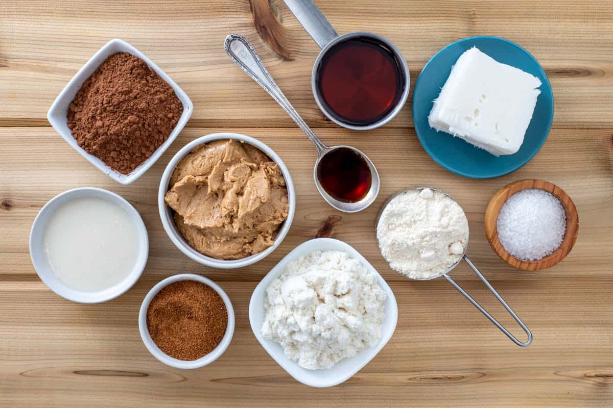 tigernut butter, carob powder, maple syrup, vanilla extract protein powder, palm oil, coconut butter, coconut sugar, and coconut oil