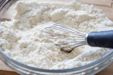 protein powder mixed in bowl with coconut flour