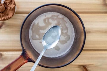 melted palm oil and coconut butter in pot