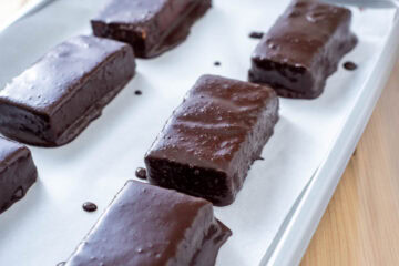 carob dipped bars on parchment paper