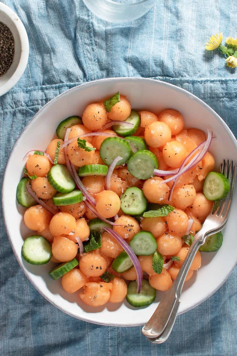 cantaloupe melon with cucumber in bowl