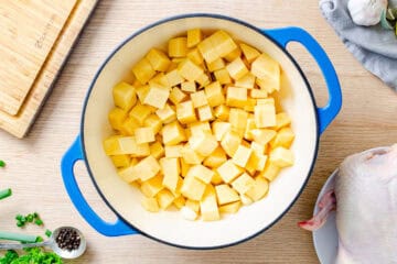 root vegetables cut large dice in baking dish with olive oil